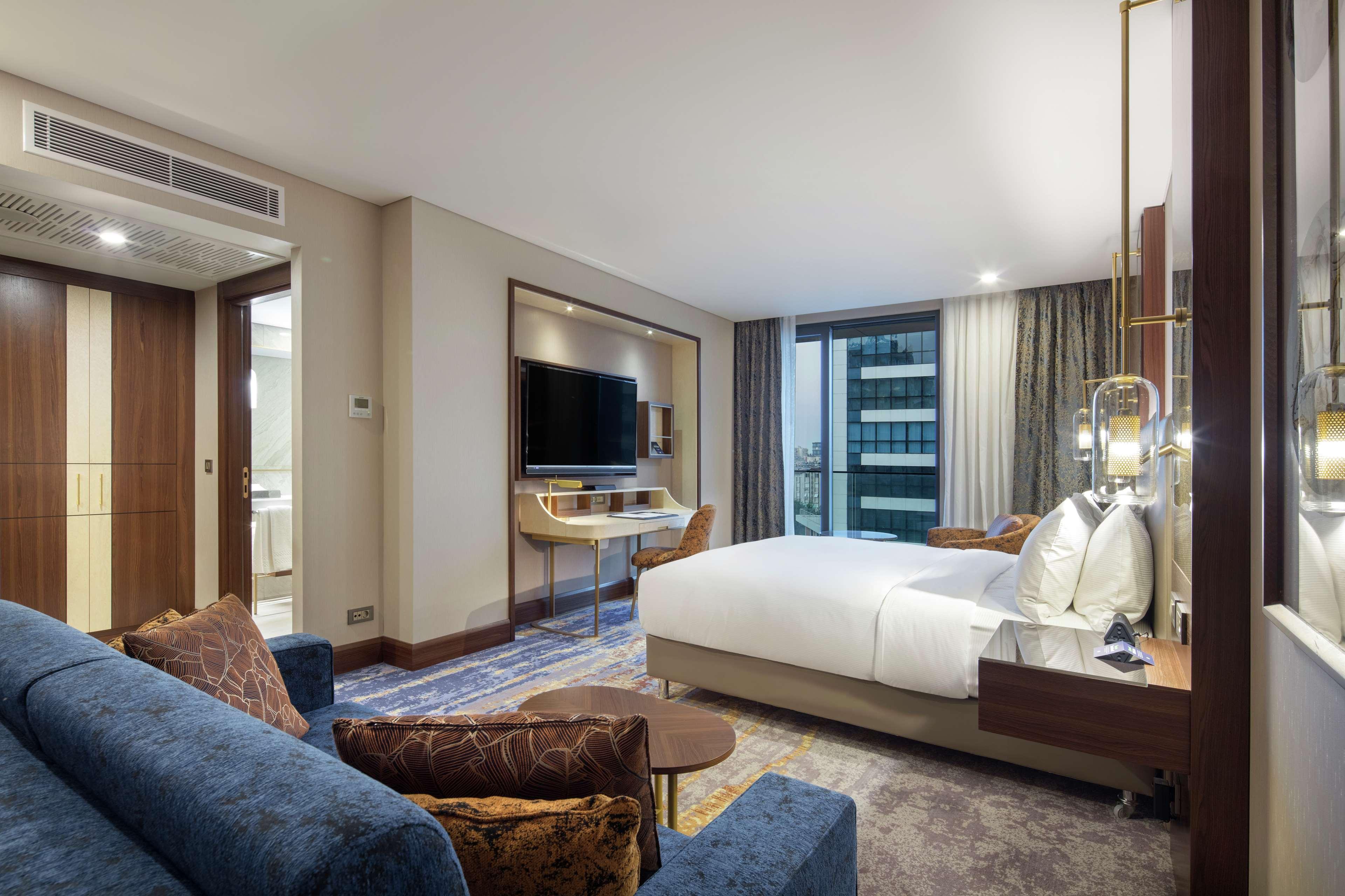 Doubletree By Hilton Antalya City Centre Экстерьер фото A suite at the hotel