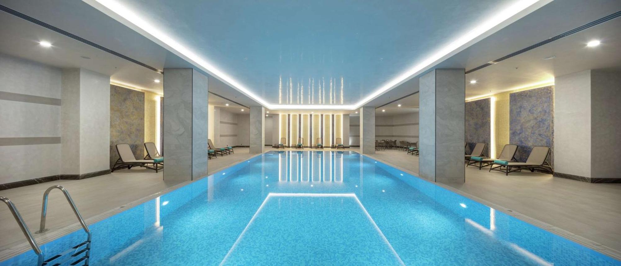 Doubletree By Hilton Antalya City Centre Экстерьер фото The swimming pool at The Dorchester