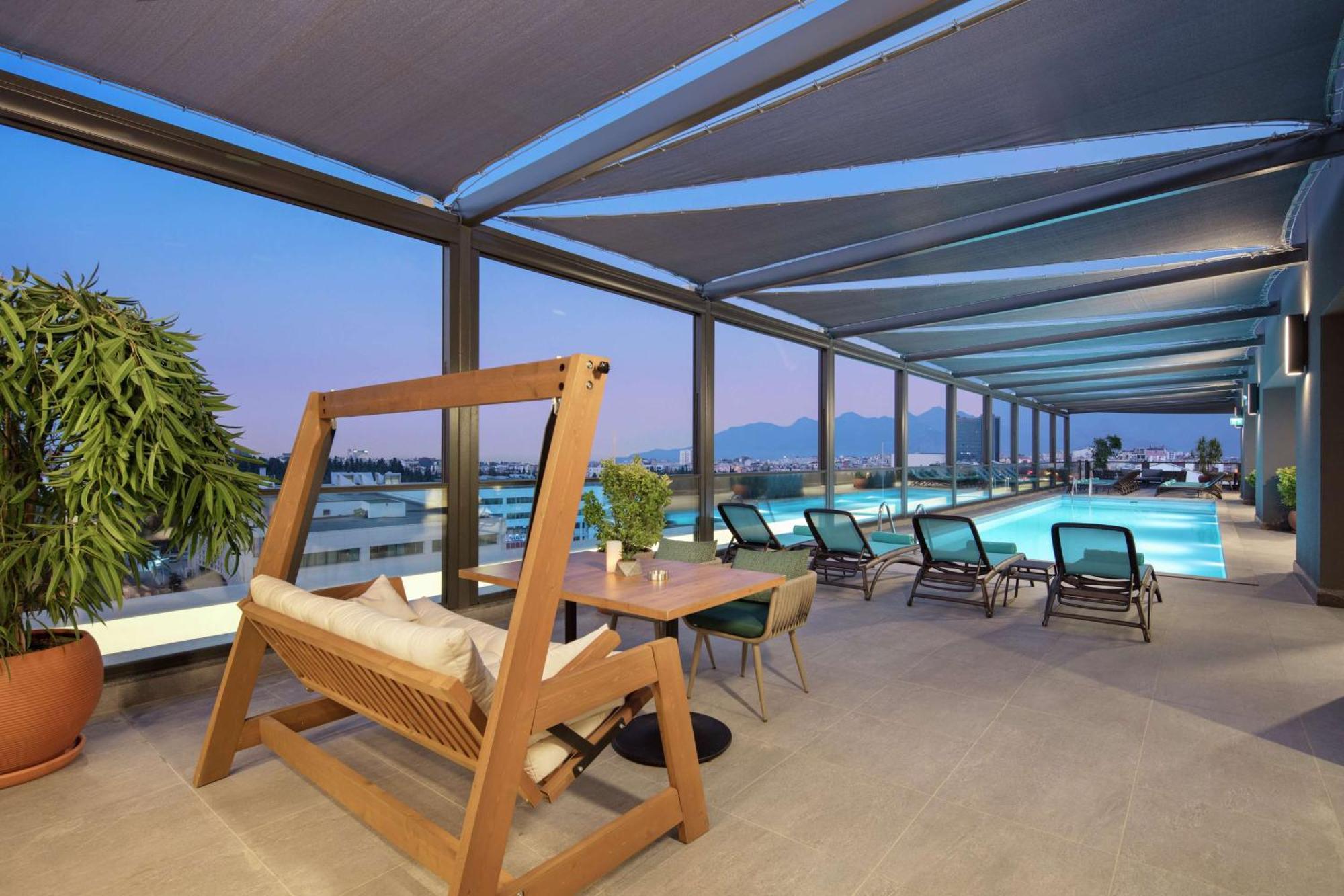 Doubletree By Hilton Antalya City Centre Экстерьер фото The hotel's rooftop pool