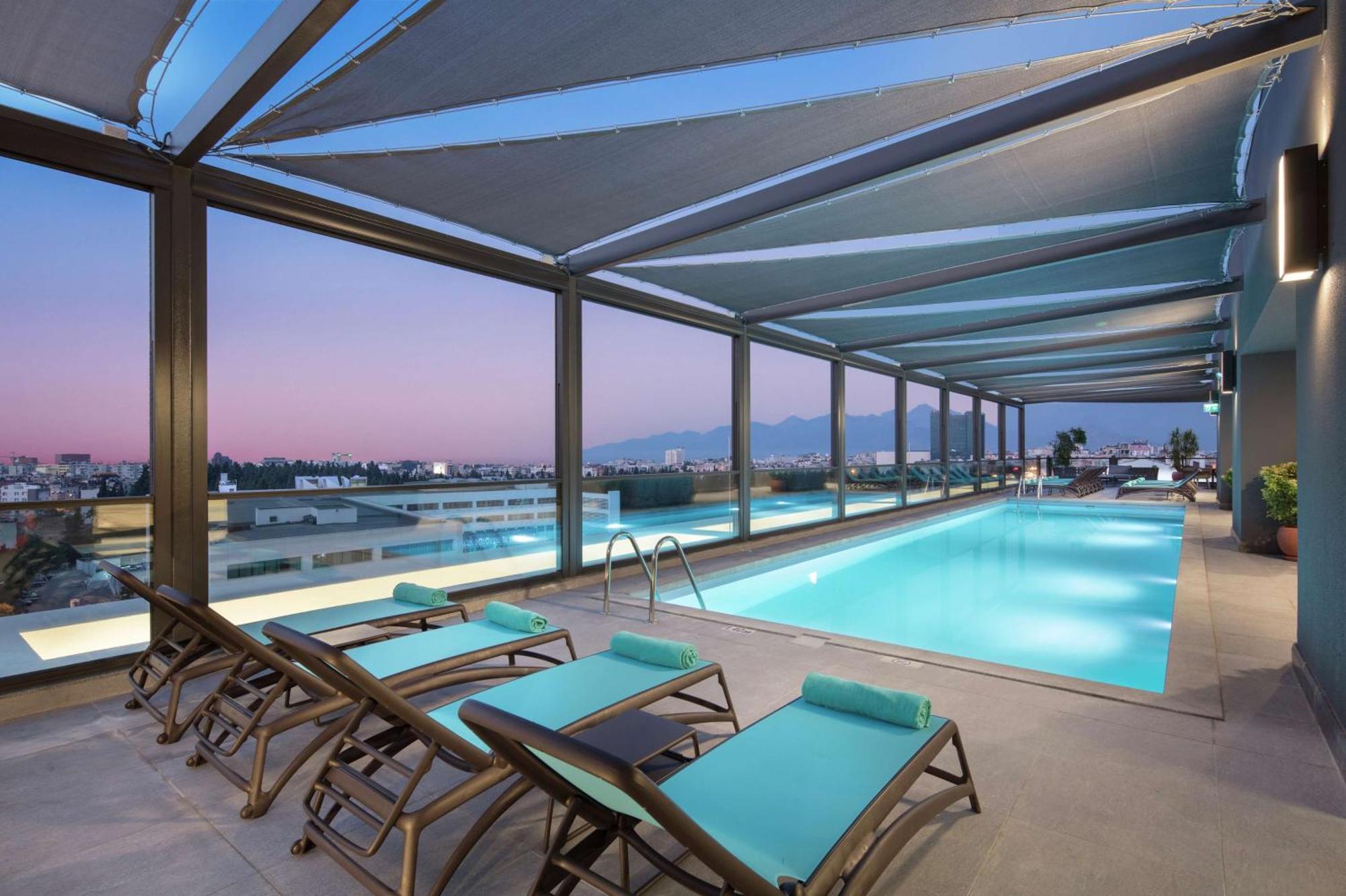 Doubletree By Hilton Antalya City Centre Экстерьер фото The pool at the hotel